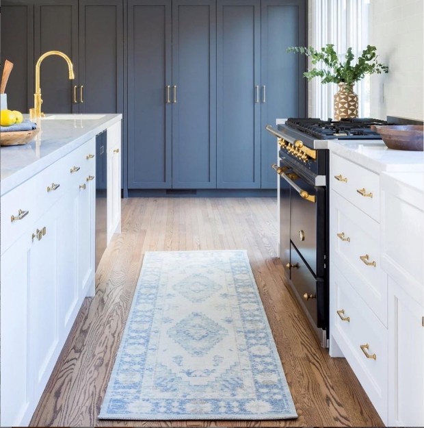 image of a blue and ivory rug in contemporary kitchen