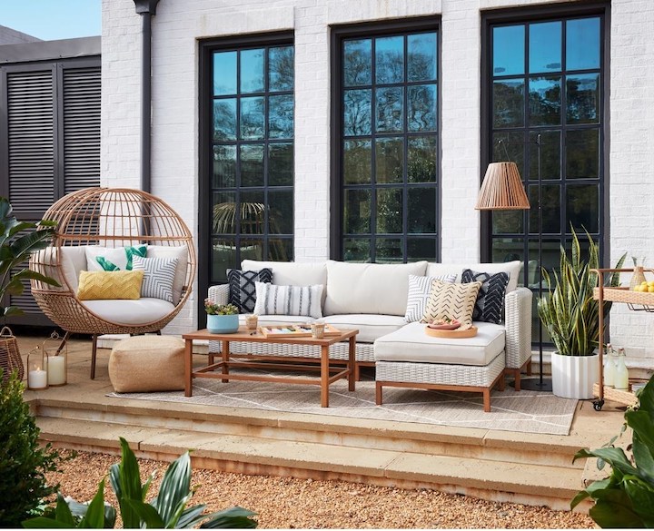 modern patio scene featuring Lowe's new Origin21 brand furniture and furnishings
