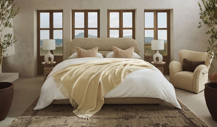 Banana Republic Home collection showcased in contemporary bedroom with textural rug