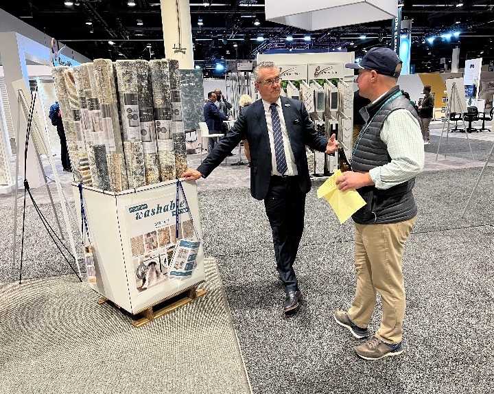 Nourison's Don Karlin talks a client through its washables display box